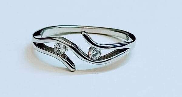 Elegant Sterling Silver Two Stone Hug Ring