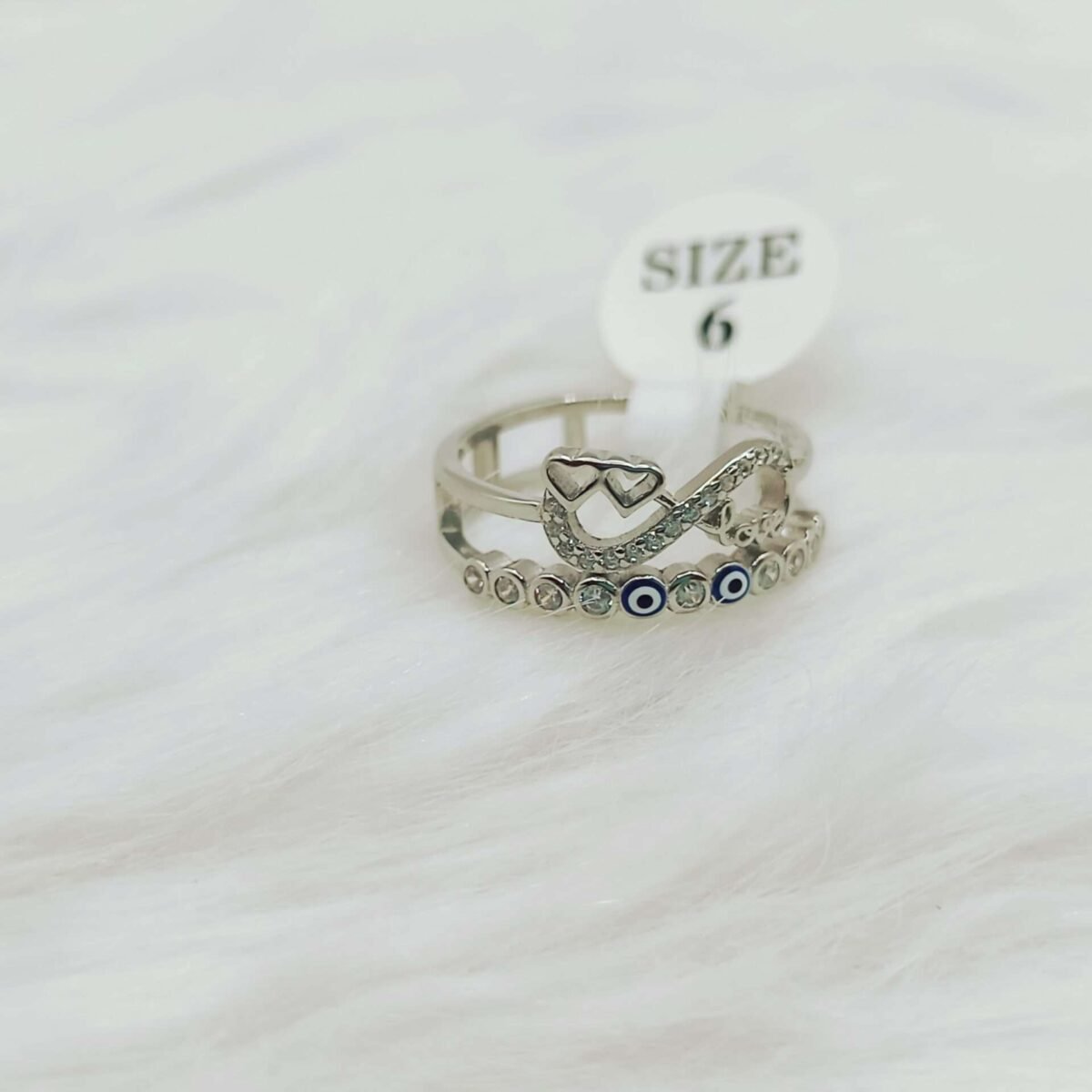Explore the Elegance of the Sterling Silver Evil Eye Heart Shape Ring